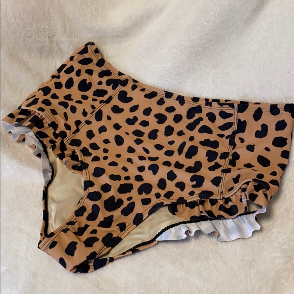 Brand new swim bottoms, large, mocha/black.